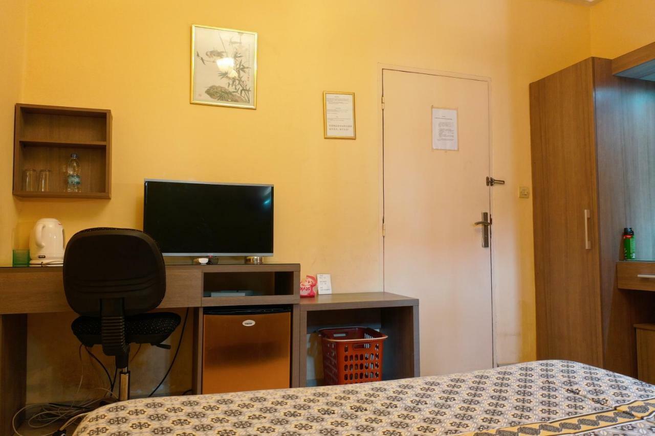 Petit Motel Beijing Абиджан Экстерьер фото