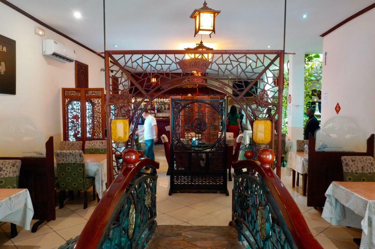 Petit Motel Beijing Абиджан Экстерьер фото